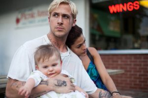 Ryan Gosling with Eva Mendez as Romina, mother of his child